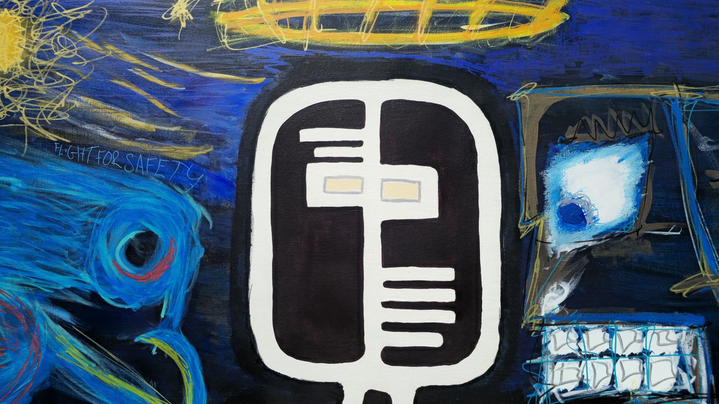 Detail of Flight for Safety: the top of the canvas — the figure’s rounded black head with white bars and two cream rectangle eyes under a loose yellow oil-stick halo, the scribbled yellow sun at upper left, the blue bird’s head with its teal-and-red-ringed eye and FLIGHT FOR SAFETY lettered above it, and at right the boxy dark creature with one glowing white eye and a grid of square white teeth.