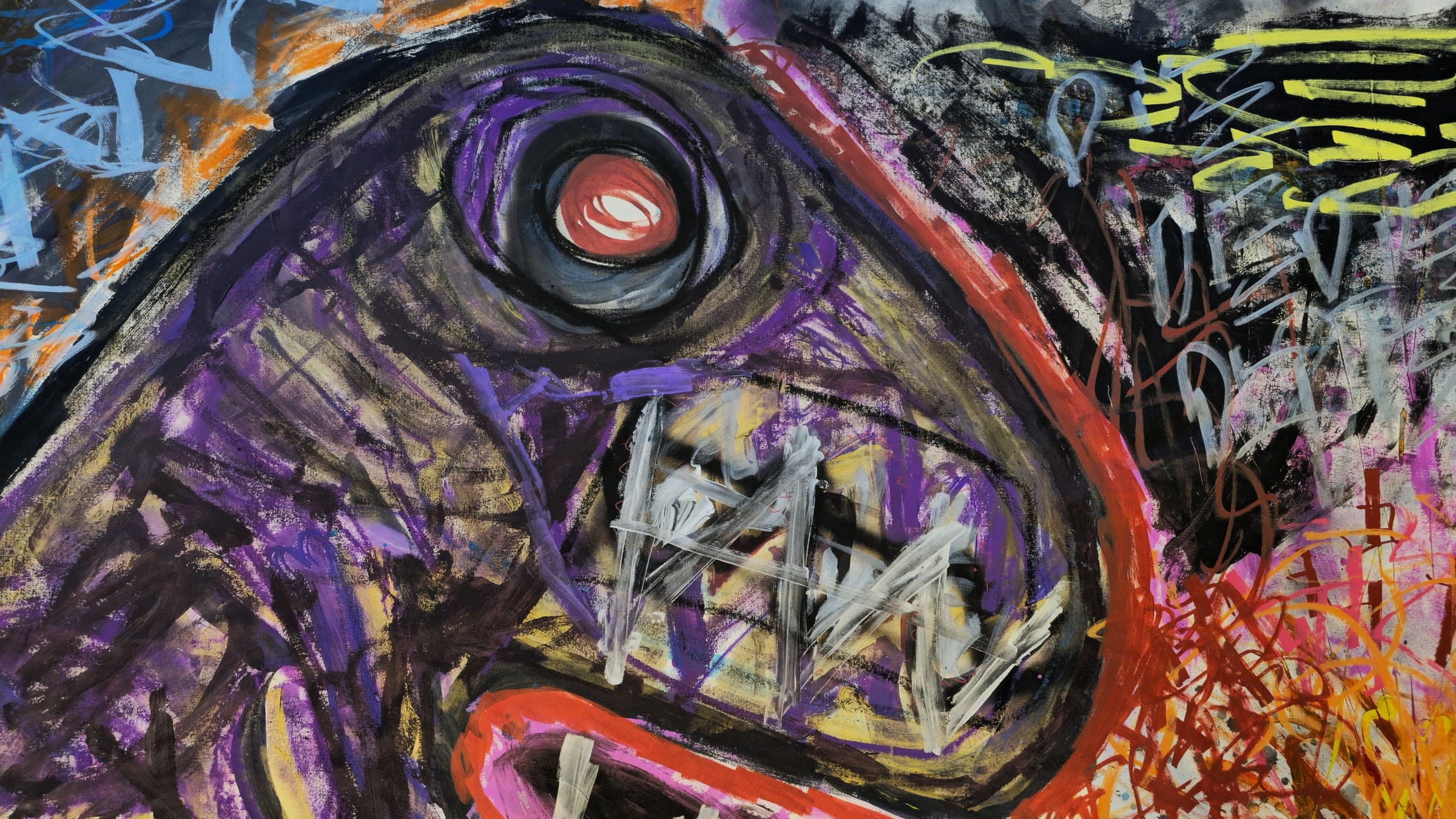 Close-up of the beast in Impactual — a red-and-white eye ringed in black and violet, the purple-and-ochre head worked in dry brushstrokes, white zigzag teeth scratched into the coral-outlined jaw, and pale blue glyph-scrawl on the panel behind.