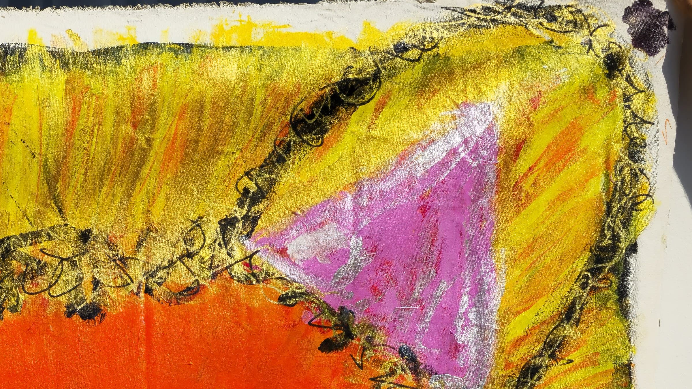 Close-up of the ear of Purrgatory — a pink-lined triangle set into the gold and yellow mane, ringed by the continuous looping black scrawl, with the orange eye-mask entering from below.